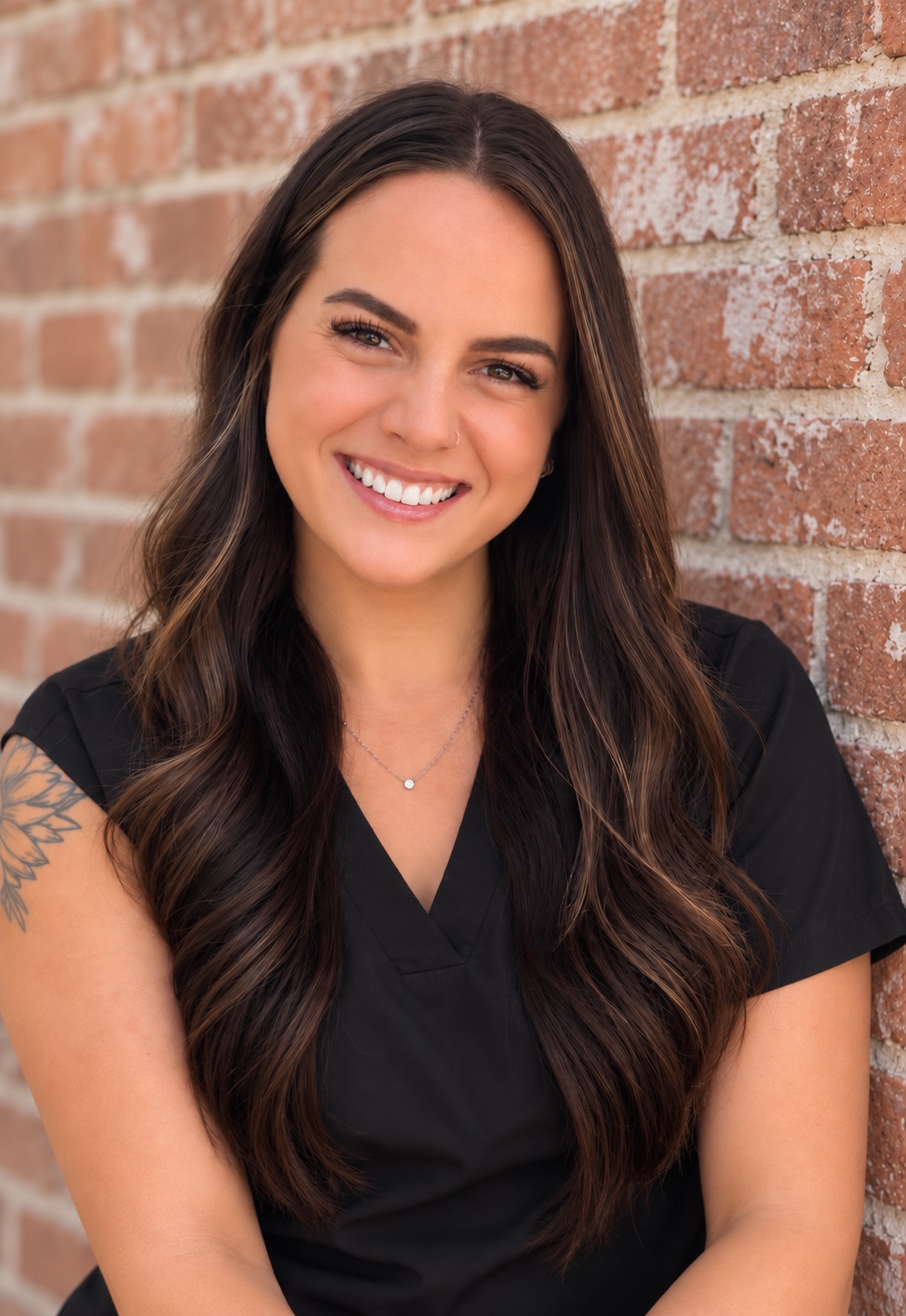 Ashley, licensed esthetician and owner of Sage & Spur Esthetics